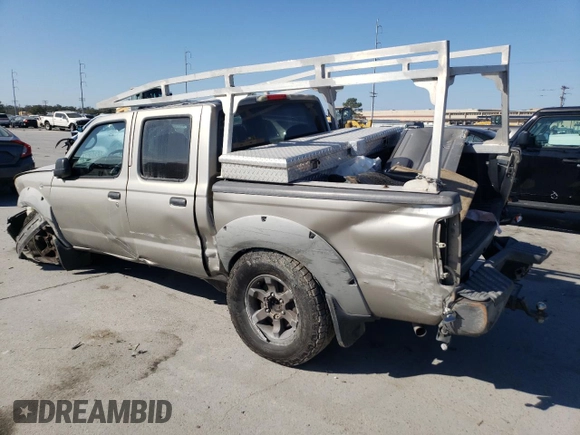 2002 Nissan Frontier SE with VIN 1N6ED27T52C383700, listed as a Copart auction lot 86204074 with 216,908 mi miles and Salvage title. Bid and sale history available at DreamBid. Image 2.