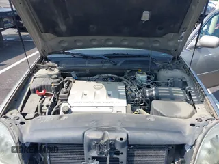 2002 Cadillac DeVille z VIN 1G6KD54Y12U219770, wystawiony jako IAAI lot #42474317 z przebiegiem 122 776 mil mil oraz . Historia ofert i sprzedaży dostępna na DreamBid. Obrazek 10.