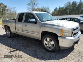 2010 Chevrolet Silverado 1500 LT with VIN 1GCSCSE03AZ298271, listed as a Copart auction lot 49427065 with 138,154 mi miles and Salvage Title. Bid and sale history available at DreamBid. Image 4.