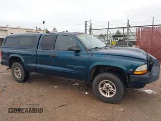 1998 Dodge Dakota SLT with VIN 1B7GG22Y9WS723805, listed as a IAAI auction lot 41289779 with 234,324 mi miles. Bid and sale history available at carsss.com. Image 1.