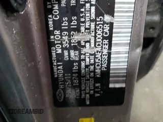 2012 Hyundai Accent SE z VIN KMHCU5AE4CU006515, wystawiony jako Copart lot #45956535 z przebiegiem 59 140 mil mil oraz Szkoda całkowita • Salvage title. Historia ofert i sprzedaży dostępna na DreamBid. Obrazek 13.