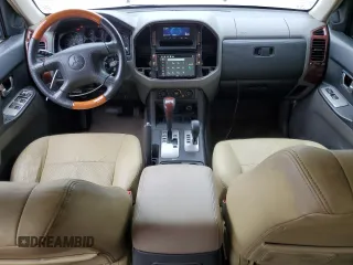 2003 Mitsubishi Montero Limited z VIN JA4NW51S23J020616, wystawiony jako Copart lot #56036365 z przebiegiem 200 785 mil mil oraz Szkody całkowita. Historia ofert i sprzedaży dostępna na DreamBid. Obrazek 8.