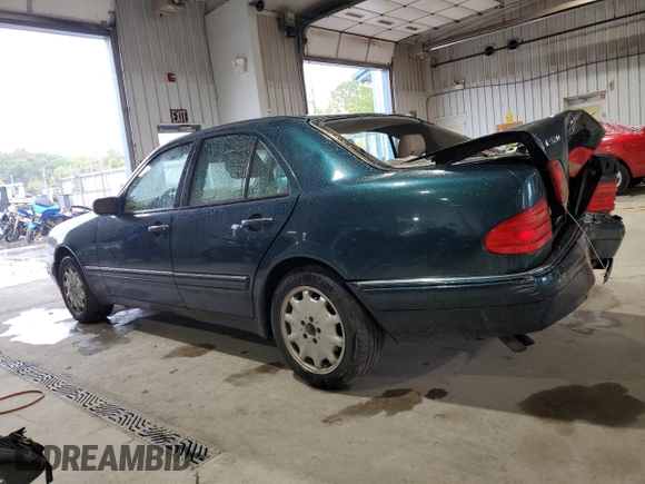 1998 Mercedes-Benz E-Class with VIN WDBJF65F6WA590094, listed as a Copart auction lot 72751984 with 196,048 mi miles and Salvage Title. Bid and sale history available at carsss.com. Image 2.