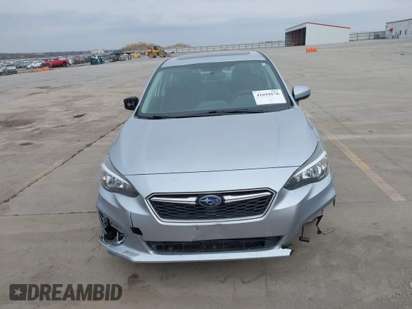 2018 Subaru Impreza Premium z VIN 4S3GKAD67J3604898, wystawiony jako IAAI lot #41694176 z przebiegiem 97 287 mil mil oraz . Historia ofert i sprzedaży dostępna na DreamBid. Obrazek 6.