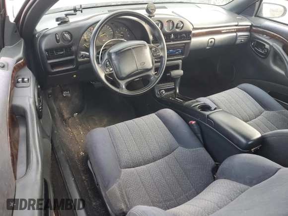 1997 Chevrolet Monte Carlo LS z VIN 2G1WW12M3V9103143, wystawiony jako Copart lot #41851645 z przebiegiem 101 836 mil mil oraz Szkoda całkowita • Salvage title. Historia ofert i sprzedaży dostępna na DreamBid. Obrazek 8.
