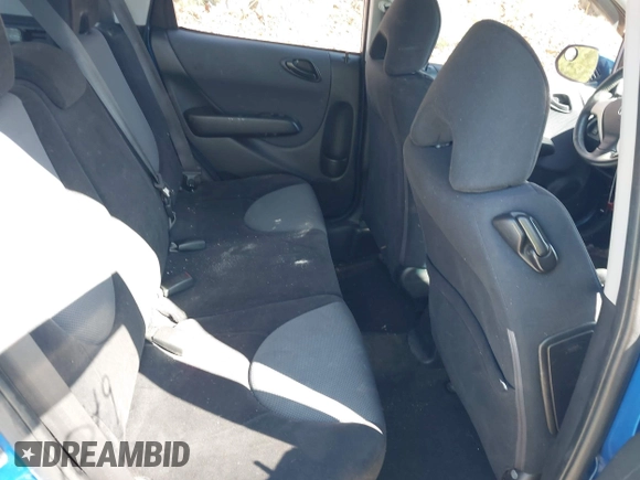 2007 Honda Fit Sport z VIN JHMGD38647S049292, wystawiony jako IAAI lot #41971049 z przebiegiem 206 846 mil mil oraz . Historia ofert i sprzedaży dostępna na DreamBid. Obrazek 8.