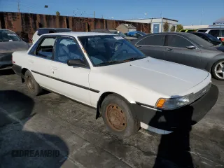 1990 Toyota Camry z VIN JT2SV21E3L0349179, wystawiony jako Copart lot #75125234 z przebiegiem 138 635 mil mil oraz Czysty tytuł • Clean title. Historia ofert i sprzedaży dostępna na DreamBid. Obrazek 4.