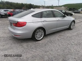 2014 BMW 3 Series 328i Gran Turismo xDrive z VIN WBA3X5C58ED558625, wystawiony jako IAAI lot #42473401 z przebiegiem 106 419 mil mil oraz . Historia ofert i sprzedaży dostępna na DreamBid. Obrazek 4.