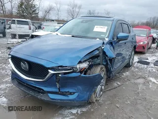 2020 Mazda CX-5 Grand Touring with VIN JM3KFBDM2L0778831, listed as a IAAI auction lot 41739655 with 72,533 mi miles. Bid and sale history available at carsss.com. Image 18.