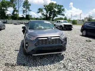 2019 Toyota RAV4 Hybrid XSE with VIN JTMEWRFV4KJ004271, listed as a Copart auction lot 61335175 with 116,457 mi miles and Salvage title. Bid and sale history available at DreamBid. Image 14.