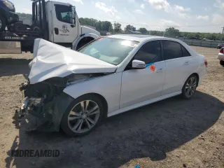 2014 Mercedes-Benz E 350 Sport with VIN WDDHF5KB8EA977634, listed as a Copart auction lot 54779165 with 228,988 mi miles and Salvage title. Bid and sale history available at DreamBid. Image 1.