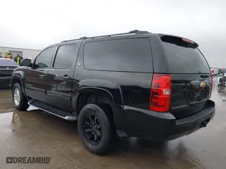 2013 Chevrolet Suburban LT with VIN 1GNSKJE71DR308480, listed as a IAAI auction lot 41695090 with 129,000 mi miles. Bid and sale history available at carsss.com. Image 3.