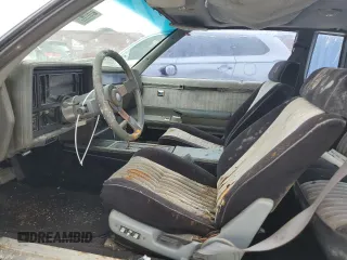 1986 Buick Regal with VIN 1G4GK4775GP227474, listed as a Copart auction lot 77446764 with 43,120 mi miles and Salvage Title. Bid and sale history available at DreamBid. Image 7.