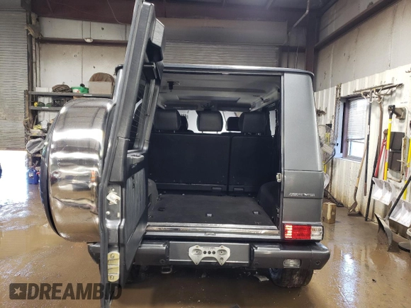 2005 Mercedes-Benz G with VIN WDCYR71E65X160243, listed as a Copart auction lot 48140075 with 164,457 mi miles and Salvage Title. Bid and sale history available at DreamBid. Image 6.