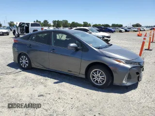 2021 Toyota Prius LE z VIN JTDKAMFPXM3190346, wystawiony jako Copart lot #57626675 z przebiegiem 102 786 mil mil oraz Szkoda całkowita • Salvage title. Historia ofert i sprzedaży dostępna na DreamBid. Obrazek 4.