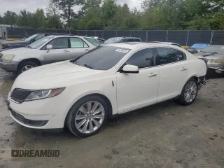 2013 Lincoln MKS EcoBoost with VIN 1LNHL9FTXDG609282, listed as a Copart auction lot 74070874 with 149,094 mi miles and Salvage Title. Bid and sale history available at carsss.com. Image 1.