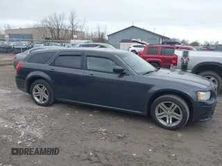 2008 Dodge Magnum SXT with VIN 2D4FV37VX8H225695, listed as a IAAI auction lot 42037741 with 196,099 mi miles and . Bid and sale history available at carsss.com. Image 13.