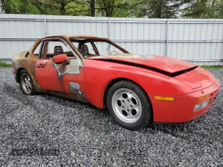 1986 Porsche 944 z VIN WP0AA0958GN152718, wystawiony jako Copart lot #55963875 z przebiegiem Nie podano mil oraz Szkoda całkowita • Salvage title. Historia ofert i sprzedaży dostępna na DreamBid. Obrazek 4.