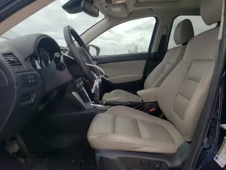 2015 Mazda CX-5 Grand Touring with VIN JM3KE4DY1F0480406, listed as a Copart auction lot 52349945 with 166,515 mi miles and Salvage Title. Bid and sale history available at carsss.com. Image 7.