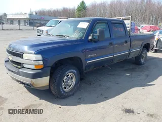 2002 Chevrolet Silverado 2500HD LS with VIN 1GCHK23U52F128404, listed as a IAAI auction lot 42079138 with 153,613 mi miles. Bid and sale history available at carsss.com. Image 2.