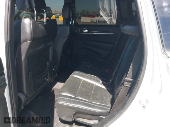 2015 Jeep Grand Cherokee Overland with VIN 1C4RJFCG3FC230185, listed as a IAAI auction lot 42494650 with 123,128 mi miles and . Bid and sale history available at DreamBid. Image 8.