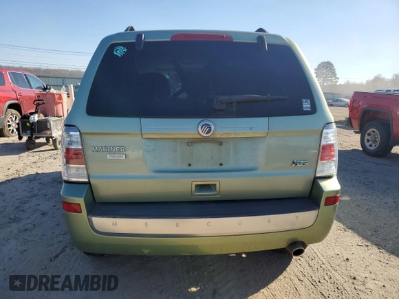 2010 Mercury Mariner Premier z VIN 4M2CN8HG9AKJ07871, wystawiony jako Copart lot #47218045 z przebiegiem Nie podano mil oraz Szkoda całkowita • Salvage title. Historia ofert i sprzedaży dostępna na DreamBid. Obrazek 6.