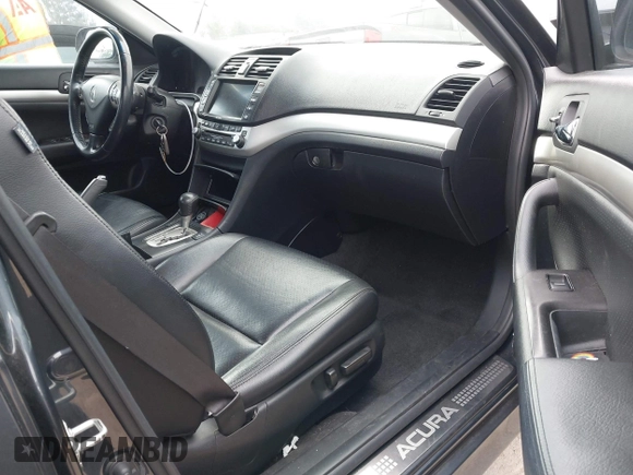 2008 Acura TSX Nav with VIN JH4CL96928C014957, listed as a IAAI auction lot 42072081 with 252,697 mi miles and . Bid and sale history available at DreamBid. Image 5.