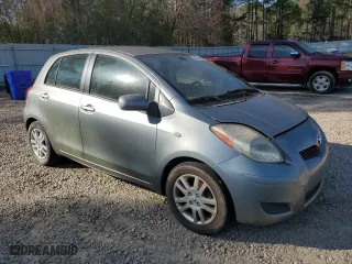 2009 Toyota Yaris with VIN JTDKT903X95240915, listed as a Copart auction lot 49143135 with 188,817 mi miles and Clean Title. Bid and sale history available at carsss.com. Image 4.