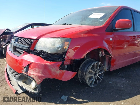 2014 Dodge Grand Caravan SXT with VIN 2C4RDGCG1ER331387, listed as a IAAI auction lot 41810447 with 118,797 mi miles and . Bid and sale history available at DreamBid. Image 6.