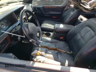 1998 Jeep Grand Cherokee Limited with VIN 1J4GZ78Y2WC146974, listed as a Copart auction lot 71435484 with 192,996 mi miles and Salvage Title. Bid and sale history available at carsss.com. Image 7.