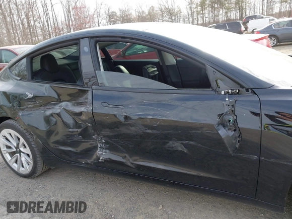 2022 Tesla Model 3 Long Range with VIN 5YJ3E1EB6NF343869, listed as a IAAI auction lot 41826077 with 36,643 mi miles and . Bid and sale history available at DreamBid. Image 12.