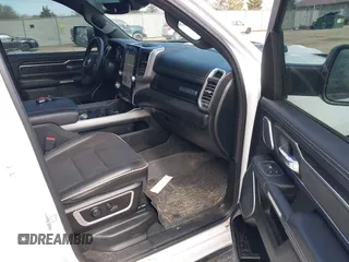 2023 Ram 1500 Laramie with VIN 1C6SRFJT8PN520610, listed as a IAAI auction lot 41898526 with 23,605 mi miles and . Bid and sale history available at DreamBid. Image 5.