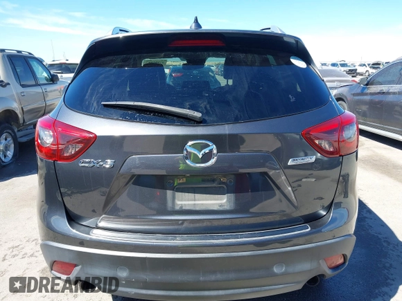 2016 Mazda CX-5 Grand Touring with VIN JM3KE2DY9G0824196, listed as a IAAI auction lot 41801887 with 88,625 mi miles. Bid and sale history available at carsss.com. Image 17.