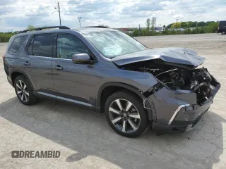 2024 Honda Pilot Touring z VIN 5FNYG1H74RB036990, wystawiony jako Copart lot #56254385 z przebiegiem Nie podano mil oraz Szkoda całkowita • Salvage title. Historia ofert i sprzedaży dostępna na DreamBid. Obrazek 4.