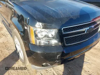 2007 Chevrolet Suburban LT with VIN 1GNFC16037R407726, listed as a IAAI auction lot 41480221 with 247,857 mi miles and . Bid and sale history available at DreamBid. Image 13.
