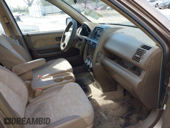 2003 Honda CR-V LX with VIN JHLRD68513C009276, listed as a IAAI auction lot 41563452 with 240,519 mi miles and . Bid and sale history available at DreamBid. Image 5.