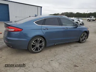 2019 Ford Fusion Titanium with VIN 3FA6P0D99KR117213, listed as a Copart auction lot 46450585 with 128,868 mi miles and Salvage Title. Bid and sale history available at carsss.com. Image 3.