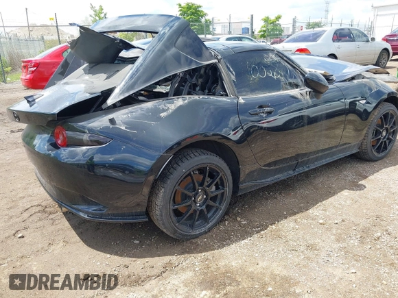 2024 Mazda MX-5 Miata Grand Touring z VIN JM1NDAM72R0607960, wystawiony jako IAAI lot #42380377 z przebiegiem Nie podano mil oraz . Historia ofert i sprzedaży dostępna na DreamBid. Obrazek 4.