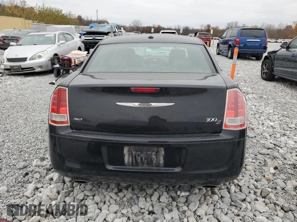 2013 Chrysler 300 S z VIN 2C3CCAGT4DH741560, wystawiony jako Copart lot #78879594 z przebiegiem 161 647 mil mil oraz Szkoda całkowita • Salvage title. Historia ofert i sprzedaży dostępna na DreamBid. Obrazek 6.