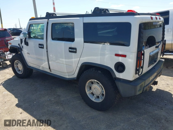 2003 Hummer H2 z VIN 5GRGN23U83H120658, wystawiony jako IAAI lot #41992183 z przebiegiem 226 207 mil mil oraz . Historia ofert i sprzedaży dostępna na DreamBid. Obrazek 3.