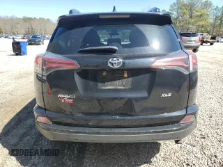 2018 Toyota RAV4 XLE with VIN 2T3WFREV7JW412348, listed as a Copart auction lot 49973215 with 127,661 mi miles and Salvage Title. Bid and sale history available at DreamBid. Image 6.