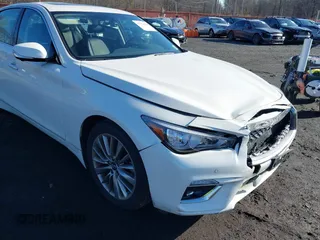2023 Infiniti Q50 Luxe z VIN JN1EV7BR8PM540570, wystawiony jako IAAI lot #41131629 z przebiegiem 5 964 mil mil oraz . Historia ofert i sprzedaży dostępna na DreamBid. Obrazek 17.