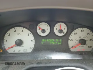 2006 Ford Taurus SEL with VIN 1FAFP56U86A194072, listed as a Copart auction lot 63779615 with 77,377 mi miles and Salvage title. Bid and sale history available at DreamBid. Image 9.