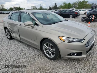 2016 Ford Fusion Titanium Hybrid with VIN 3FA6P0RUXGR192149, listed as a Copart auction lot 54270795 with 175,260 mi miles and Salvage title. Bid and sale history available at DreamBid. Image 4.