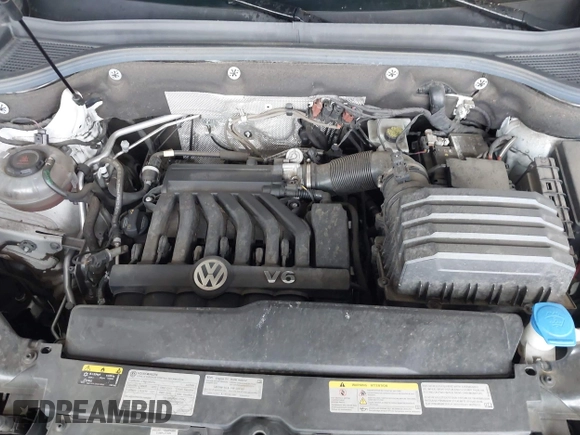 2021 Volkswagen Atlas SE z VIN 1V2NE2CA4MC201281, wystawiony jako IAAI lot #41242760 z przebiegiem 95 209 mil mil oraz . Historia ofert i sprzedaży dostępna na DreamBid. Obrazek 10.