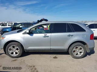 2011 Ford Edge SEL with VIN 2FMDK3JC8BBA76519, listed as a IAAI auction lot 41777029 with 245,098 mi miles. Bid and sale history available at carsss.com. Image 13.