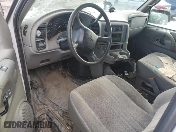 2002 Chevrolet Astro Cargo z VIN 1GCDL19X62B131620, wystawiony jako Copart lot #86748144 z przebiegiem Nie podano mil oraz Szkoda całkowita • Salvage title. Historia ofert i sprzedaży dostępna na DreamBid. Obrazek 8.