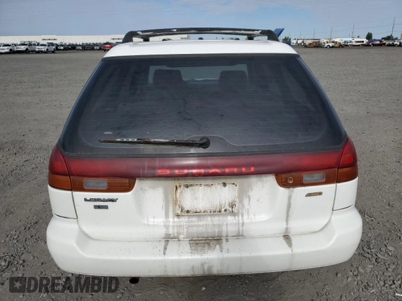 1997 Subaru Legacy L with VIN 4S3BK4359V7309059, listed as a Copart auction lot 59600835 with 136,620 mi miles and Salvage title. Bid and sale history available at DreamBid. Image 6.