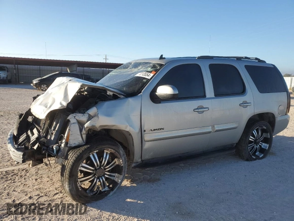 2009 GMC Yukon SLE w/3SB with VIN 1GKFK23079R128194, listed as a Copart auction lot 77213554 with 224,172 mi miles and Salvage Title. Bid and sale history available at carsss.com. Image 1.