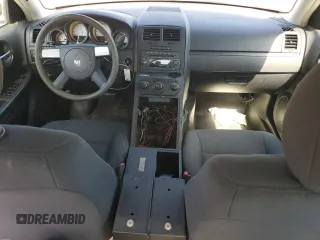 2010 Dodge Charger Police with VIN 2B3AA4CT2AH203453, listed as a Copart auction lot 69824824 with 195,153 mi miles and Salvage Title. Bid and sale history available at DreamBid. Image 8.